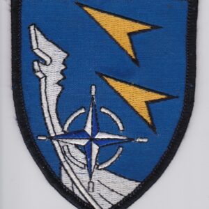 A blue and white patch with a compass and an arrow.