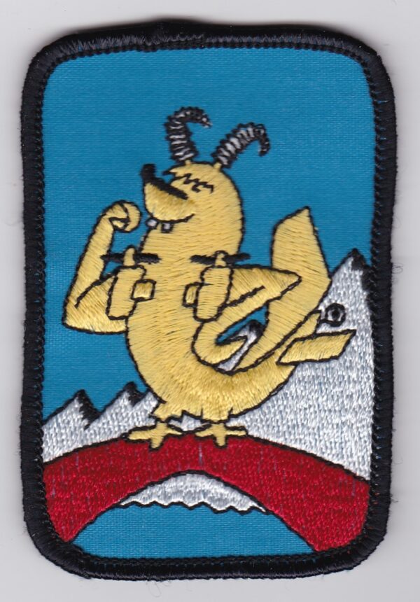 A patch with an image of a bird on it.