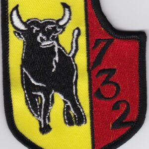 A badge with a bull on it.