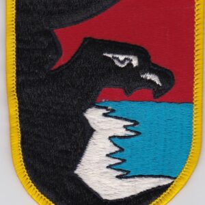 A patch with an eagle on it.