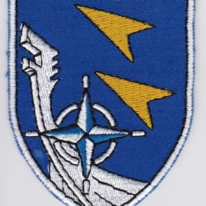 A blue and yellow patch with a compass on it.