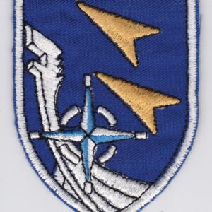 A blue and white patch with an arrow on it.