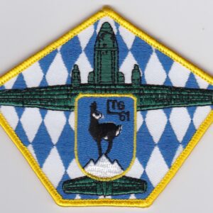 A blue and white patch with an image of a plane.