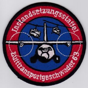 A red and blue color patch with an airplane on it.