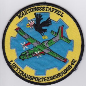 A patch with a bird and a plane on it.