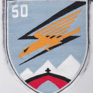 A patch with an eagle on it.