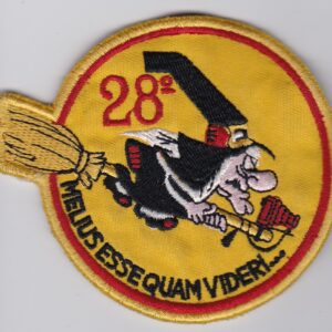 A patch with a cartoon image of a broom.