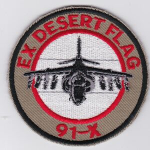 Ex desert flag patch with an airplane on it.