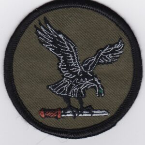 A patch with an eagle and a knife on it.