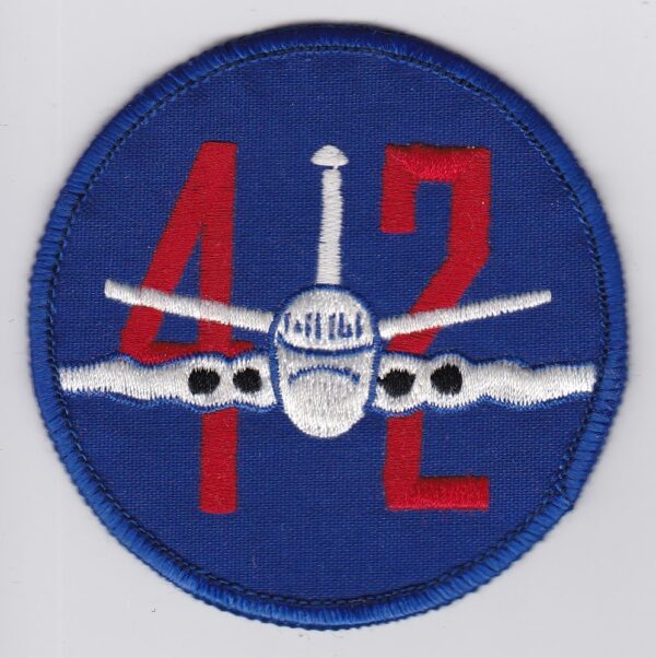 Blue and red patch with a plane and the number 412.