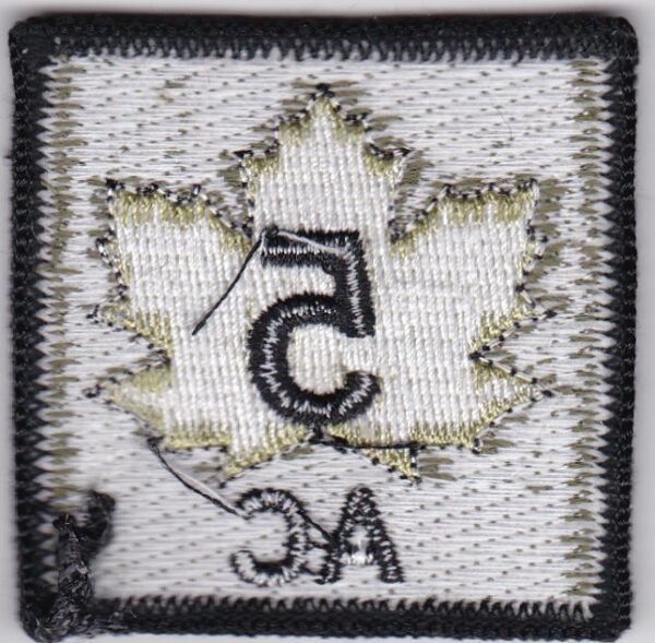 White maple leaf with number 5 inside.