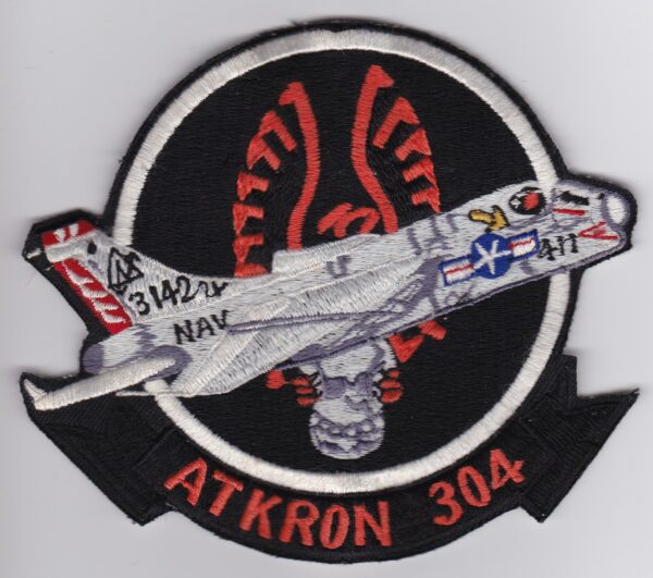 A patch with the words akron 3034 on it.