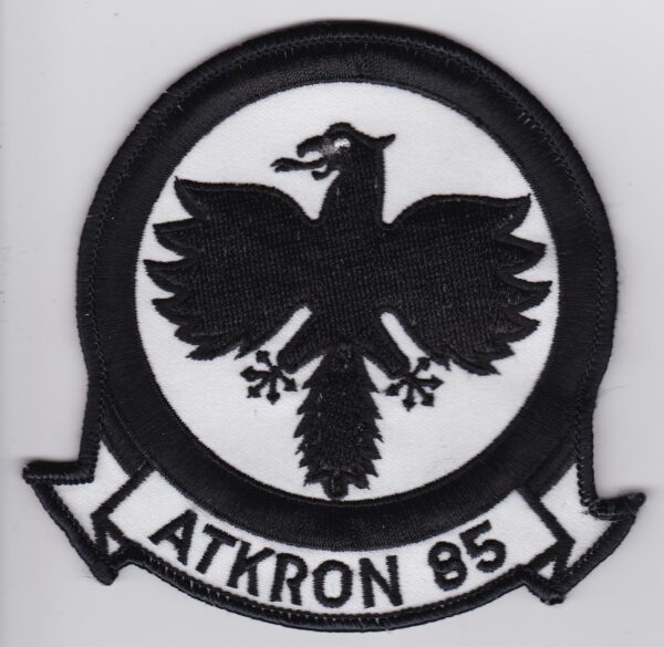 A black and white patch with an eagle on it.