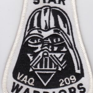 A star wars patch with the word vader on it.