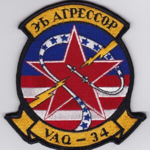 A patch with the word vaq on it.