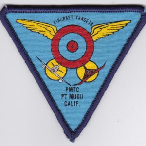 A triangular patch with an airplane and an arrow on it.