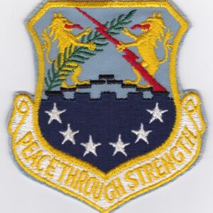 A patch with the words peace through strength.