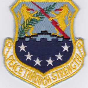 A patch with the words peace through strength.