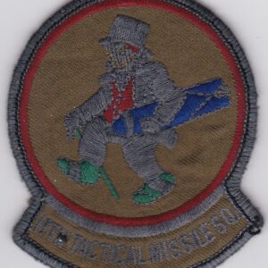 A patch with an image of a man with a hat and a gun.