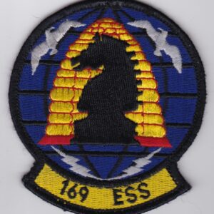 A patch with the word ess on it.