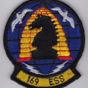 A patch with the word ess on it.