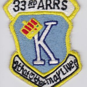 33rd arrs patch with k letter on it.