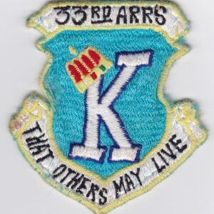 A patch with the words k that others may live.