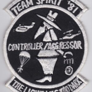 A patch with the words team spirit 911 controller aggressor.