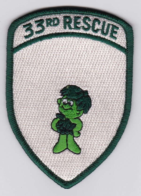 A green and white patch with the words 3rd rescue on it.