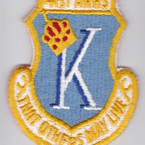 A patch with the letter k on it.