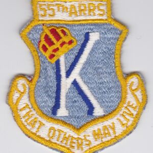 A patch with the words k that others may live on it.