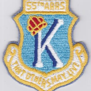 A patch with the letter k on it.