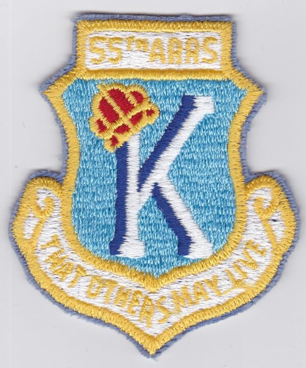 A patch with the letter k on it.