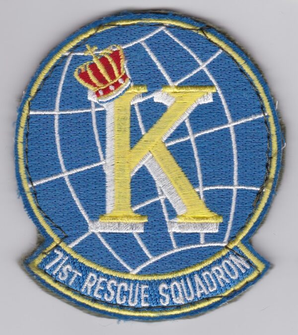 A patch with the letter k on it.