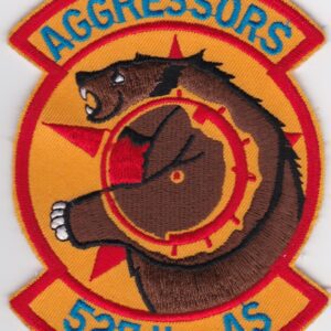 A badge with the words agressors 527th as.