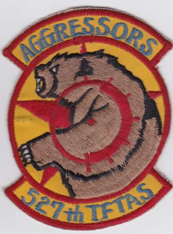 A badge with the words agressors 5th texas.