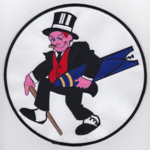 A round patch with a man in a top hat and a cane.