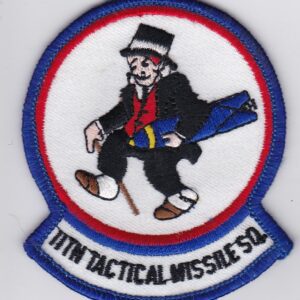 A patch with an image of a man in a top hat.