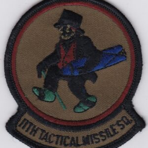 A patch with an image of a man in a top hat.