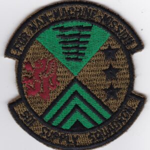 A patch with a green and red emblem on it.