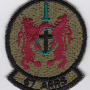 A patch with a lion and a cross on it.