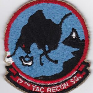 A patch with an image of a dog on it.