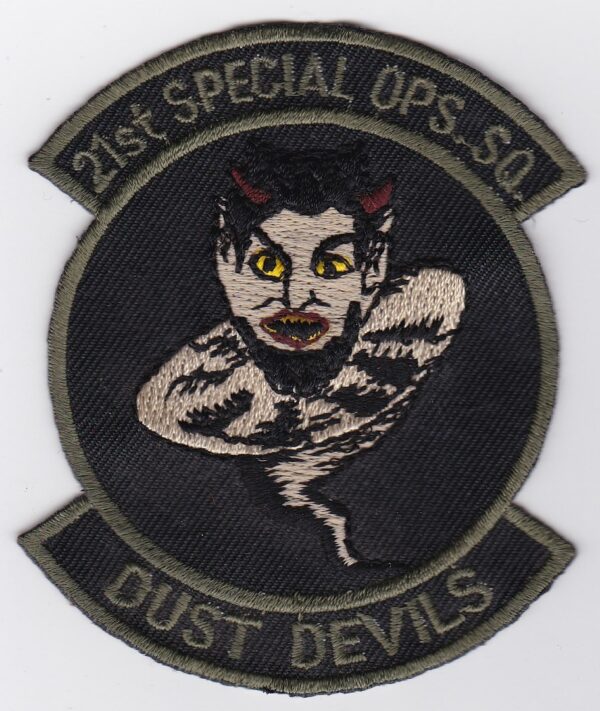 A patch with the words dust devils on it.