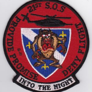 A patch with an image of a helicopter and a dog.