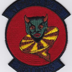 A patch with an image of a devil on it.