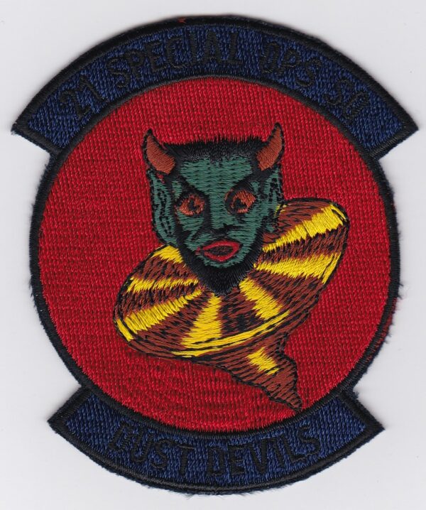 A patch with an image of a devil on it.