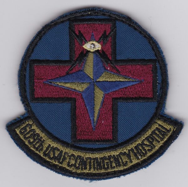 A patch with a cross and a star on it.