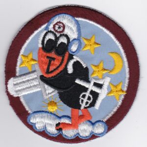 A patch with an image of a bird with a gun.