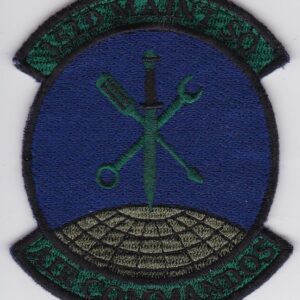 A patch with a sword and a cross on it.