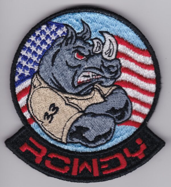 A patch with an image of a rhino wearing an american flag.